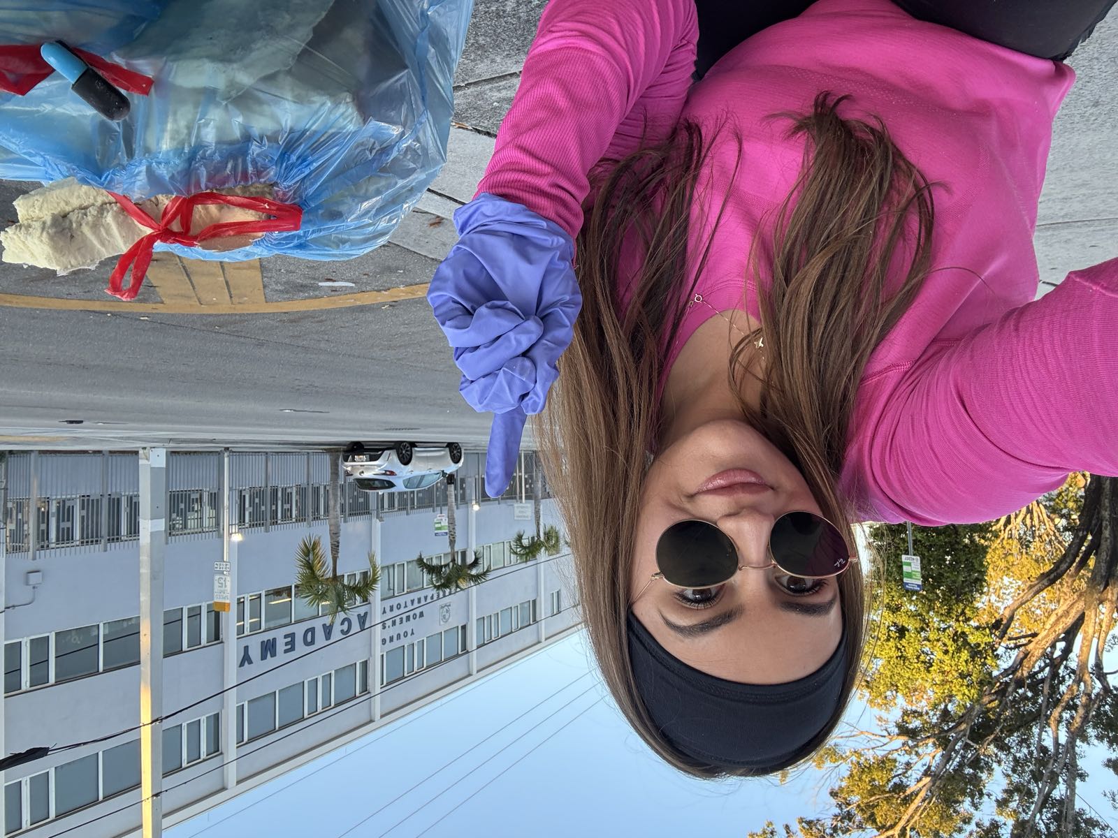 Patricia picking up litter in her neighborhood