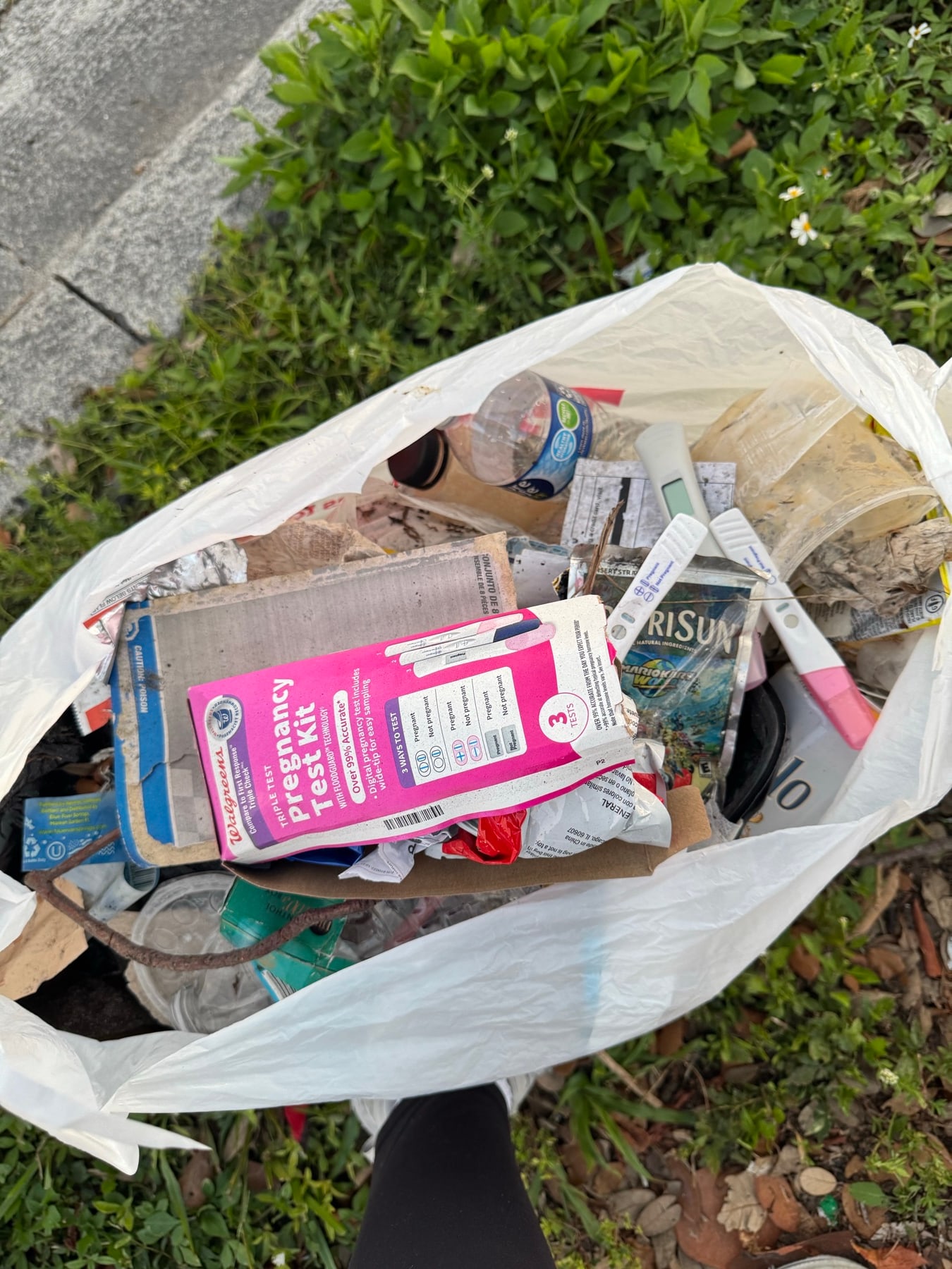 Packaging and litter bagged up off the ground